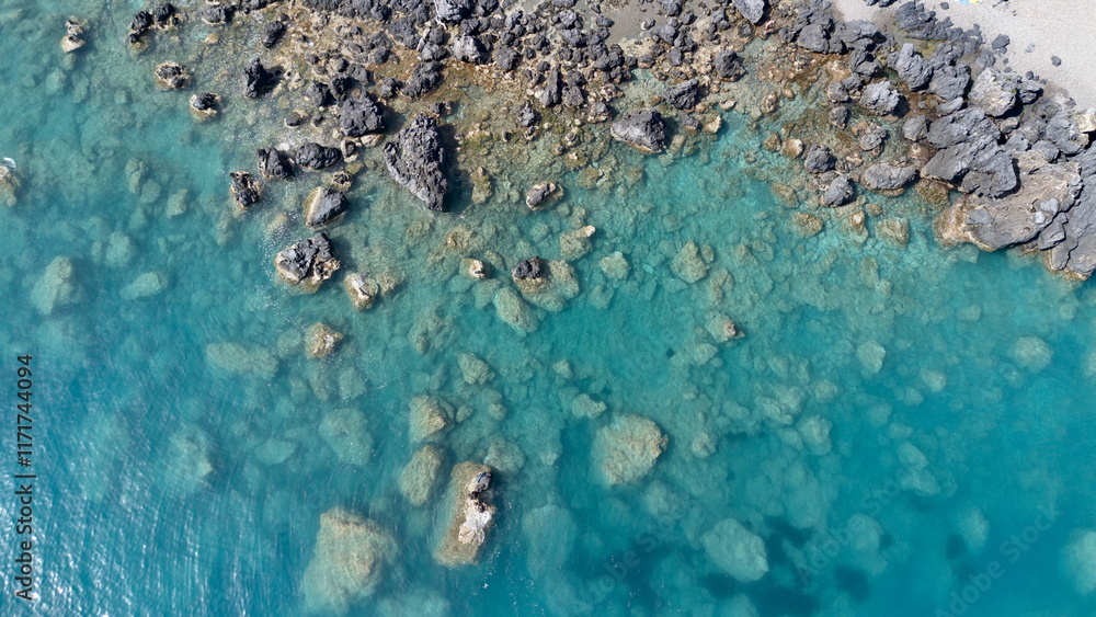 aerial view from above of blue sea and rocks in transparent view waves aerial view from above of blue sea and rocks in transparent view waves