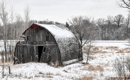 Wallpaper Mural weathered old wood barn in the winter snow Torontodigital.ca