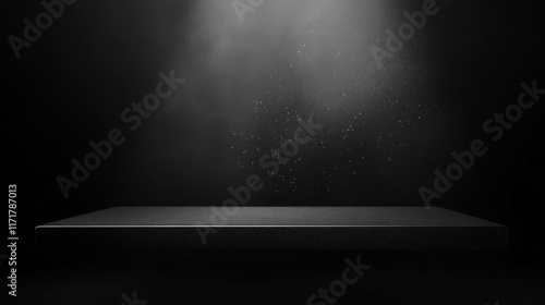 Dark moody product display with spotlight