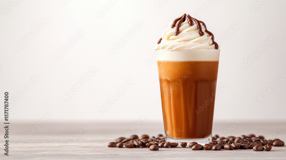 Creamy iced coffee topped with cho te drizzle and whipped cream Creamy iced coffee topped with cho te drizzle and whipped cream