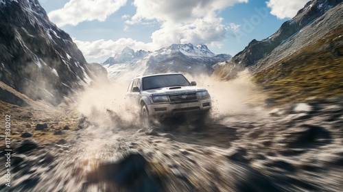 Off-road vehicle driving on a rocky mountain path, kicking up dust. photo