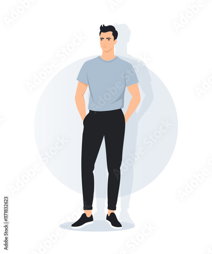 A young man in a light blue t-shirt and black pants stands in a casual pose. Laconic modern style for everyday look.