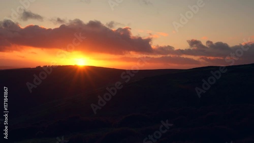 Wallpaper Mural Dawn Breaking Over a Dark Rolling Hill Landscape in England Torontodigital.ca