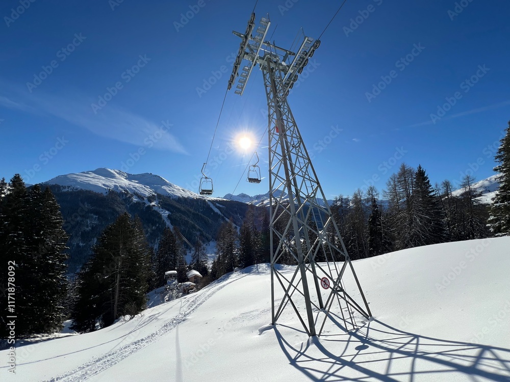 2persons Chairlift (fixed-grip), Chairlift at the ski resort over the Davos - Canton of Grisons, Switzerland (Sesselbahn Schatzalp-Strelaberg, Davos - Kanton Graubünden, Schweiz) 2persons Chairlift (fixed-grip), Chairlift at the ski resort over the Davos - Canton of Grisons, Switzerland (Sesselbahn Schatzalp-Strelaberg, Davos - Kanton Graubünden, Schweiz)