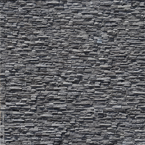 Seamless stone texture of modern stacked charcoal slabs wall veneer