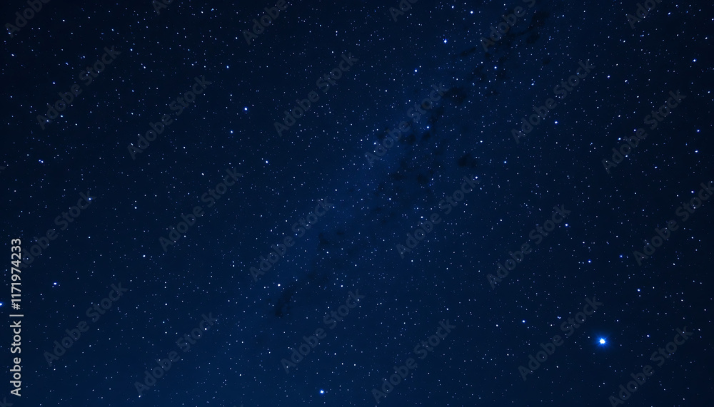 Obraz premium Starry sky background, blue night sky full of stars, glowing stars in the dark space, starry background, dark night, stars in the distance, starlight, dark background with a blue glow, night sky. 