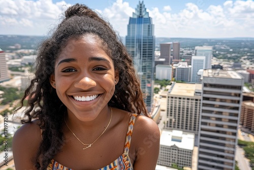 Joyful young girl smiling austin city skyline portrait urban environment close-up happiness concept photo