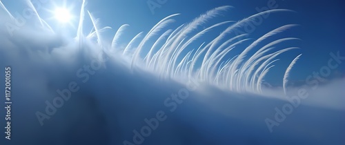 Whimsical windcatchers swaying in the breeze against a blue sky photo