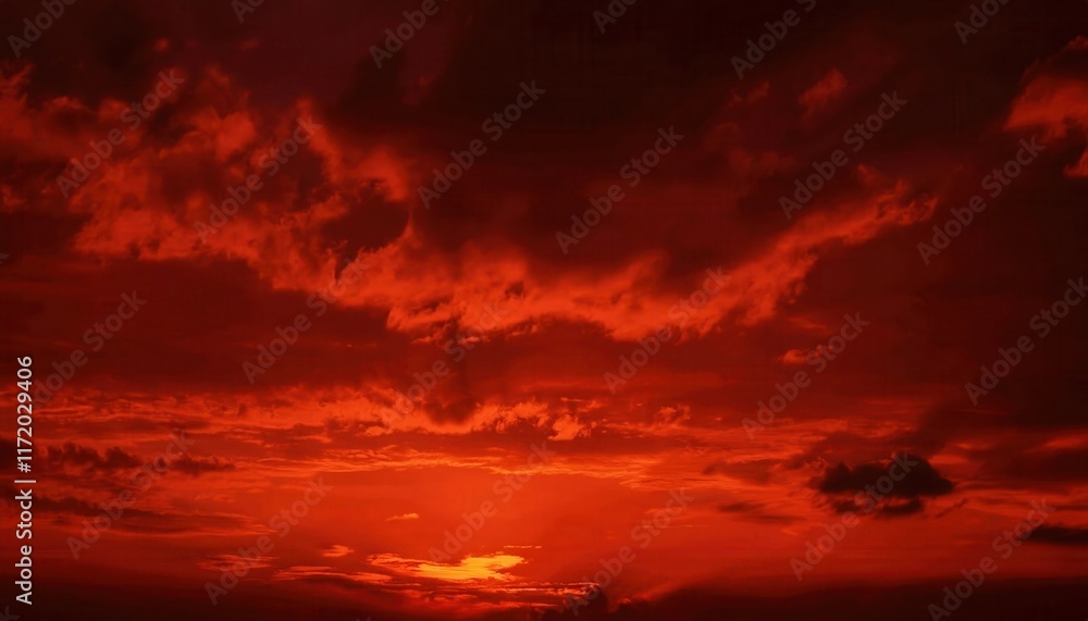 Fiery Red Sunset Sky with Dramatic Cloud Formations and Intense Warm Glow, Perfect for Atmospheric Nature Art or Background Concepts Fiery Red Sunset Sky with Dramatic Cloud Formations and Intense Warm Glow, Perfect for Atmospheric Nature Art or Background Concepts