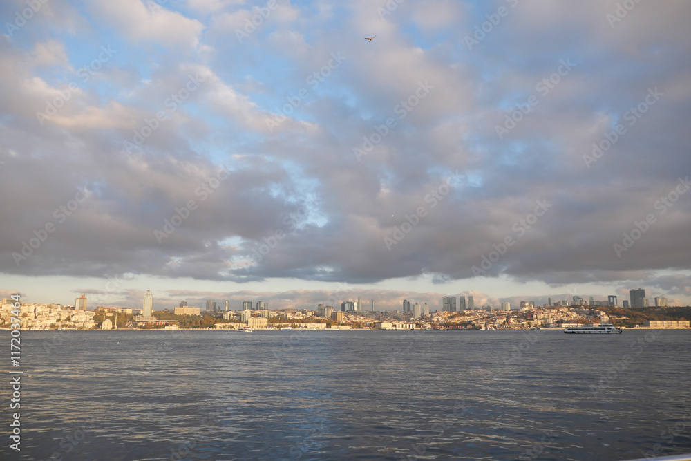 Stunning Cityscape Reflection Over Serene Water Beneath Dramatic Cloudy Sky