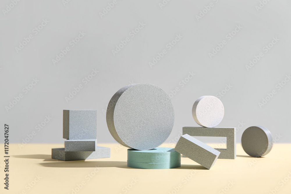 Set of different building blocks against grey background Set of different building blocks against grey background