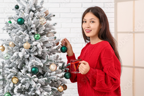 Beautiful young happy Asian...