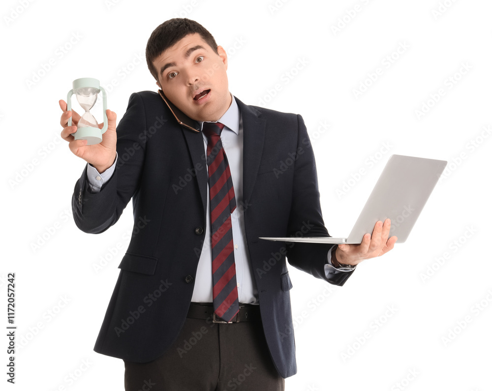 Stressed businessman with laptop and alarm clock talking by mobile phone on white background. Time management concept Stressed businessman with laptop and alarm clock talking by mobile phone on white background. Time management concept