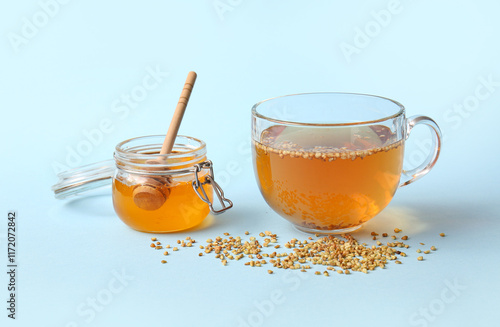 Honey jar with dipper and b...