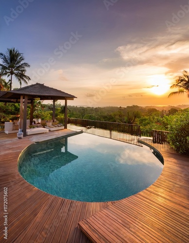 Swimming pool in luxury hotel resort at sunset time. Swimming pool with view on tropical landscape
