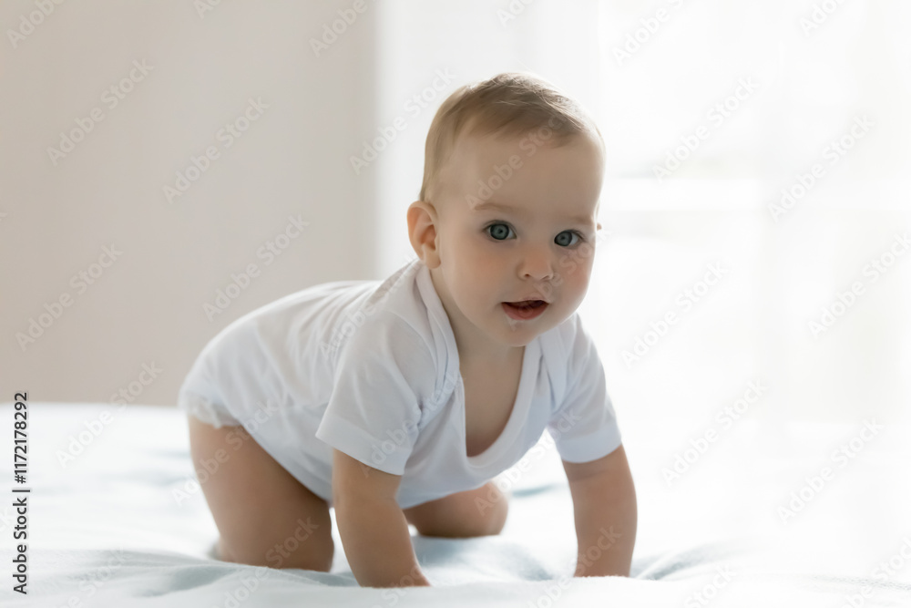 Milestone of healthy growth and development. Portrait curious excited small infant baby wear diaper white sleeveless suit crawl on large bed at home explore the world around look at camera. Copy space Milestone of healthy growth and development. Portrait curious excited small infant baby wear diaper white sleeveless suit crawl on large bed at home explore the world around look at camera. Copy space