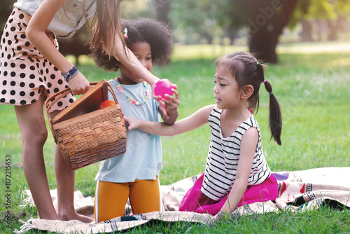 Girls of different nationalities play together in a public park, diverse nation children playing together concept photo