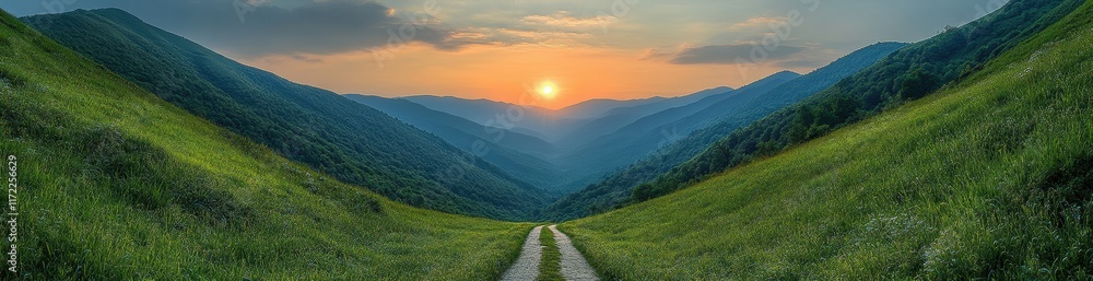 Obraz premium The sun is setting over a mountain range, casting a warm glow over the landscape
