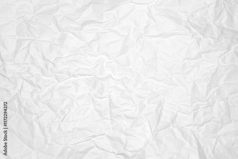 Obraz premium Crumpled white paper background creating texture pattern.