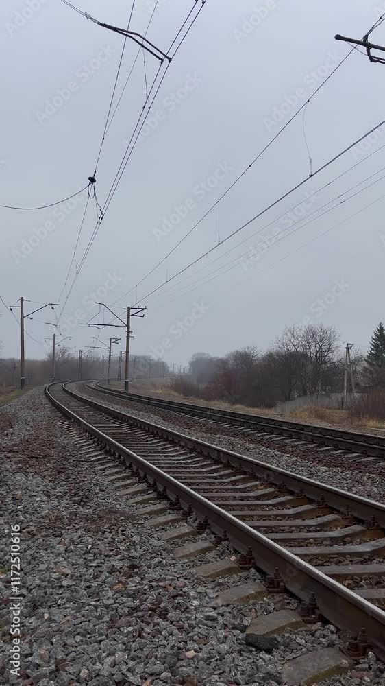 Railway rails that go into the distance. Railway. The road of life. The concept of waiting, life paths, moving, traveling. Railway rails that go into the distance. Railway. The road of life. The concept of waiting, life paths, moving, traveling.