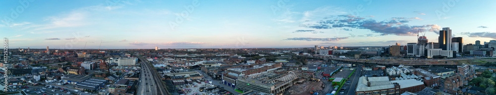 Obraz premium High Angle Ultra Wide Panoramic View of Buildings at Downtown Central Birmingham City of England United Kingdom During Sunset. Aerial View of Was Captured with Drone's Camera on March 30th, 2024