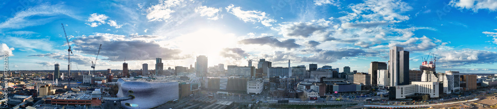 Obraz premium High Angle Ultra Wide Panoramic View of Buildings at Downtown Central Birmingham City of England United Kingdom During Sunset. Aerial View of Was Captured with Drone's Camera on March 30th, 2024