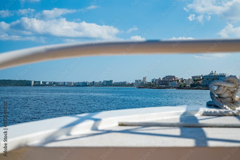 Fototapeta premium Coastal cityscape viewed from a boat