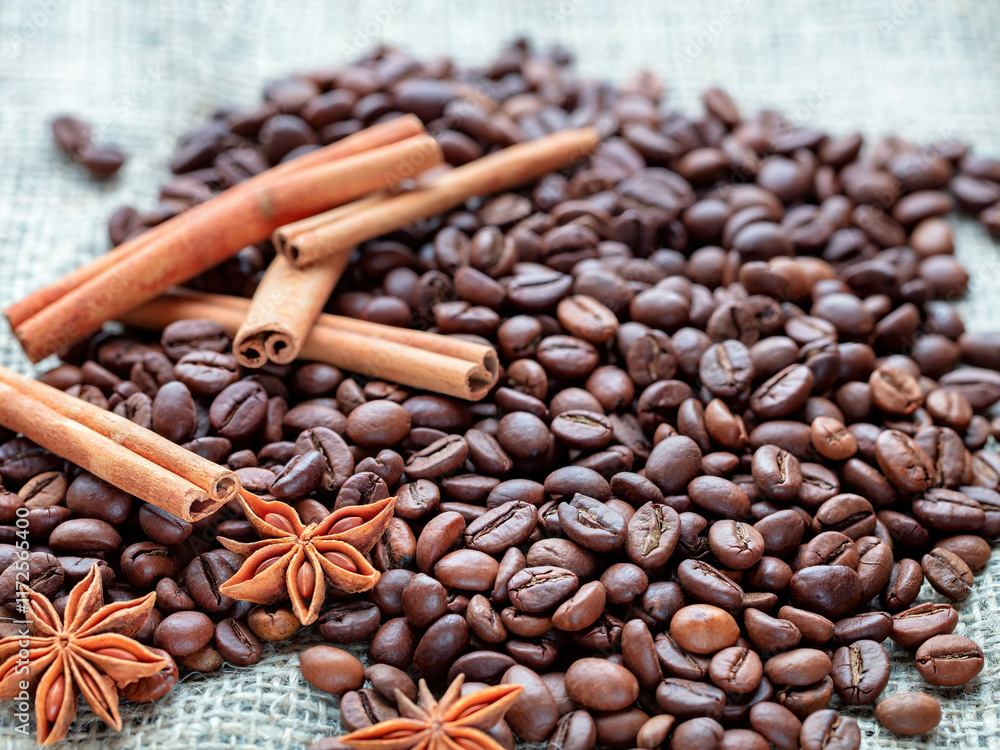 Exploring the rich aromas of roasted coffee beans and spices on a textured surface