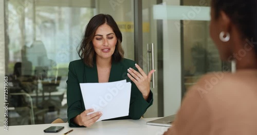 Pretty Mexican HR manager interviewing African female, hiring applicant shaking hands, accomplish job interview successfully, feel satisfied with candidature qualification, education and competence