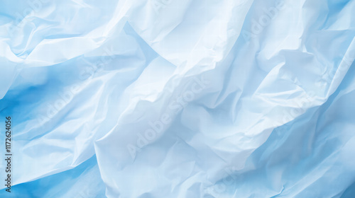 Wallpaper Mural Soft blue crumpled tissue paper creates serene and cozy winter atmosphere, perfect for various creative projects and seasonal decorations Torontodigital.ca