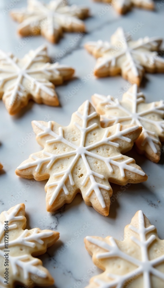 Snowflake sugar cookies on a marble surface cooling, treats, marble Snowflake sugar cookies on a marble surface cooling, treats, marble