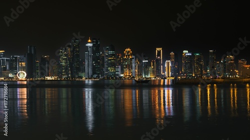 Wallpaper Mural Doha skyline at night with reflections on water. Torontodigital.ca