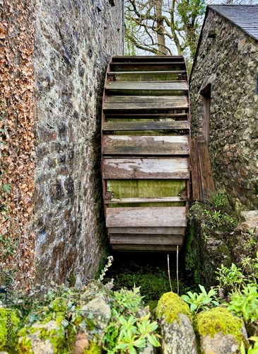 Rustic wooden waterwheel photo