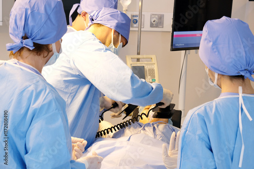 Male doctor using CPR in emergency room. photo