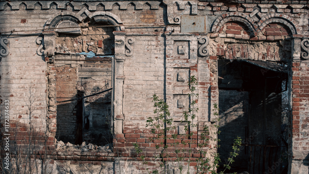 Fototapeta premium destroyed and burned houses in the city in Ukraine