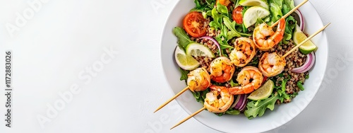 Grilled shrimp skewers served with a side of quinoa salad, white backdrop