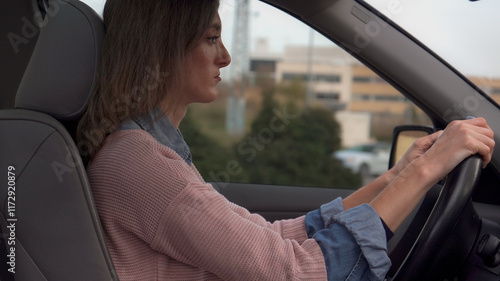 Obraz na płótnie Young woman feeling fatigue while driving car in the city w salonie