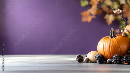 Autumn harvest scene pumpkins, berries, and fall leaves on a wooden table against a purple background, perfect for Thanksgiving or fall season greetings