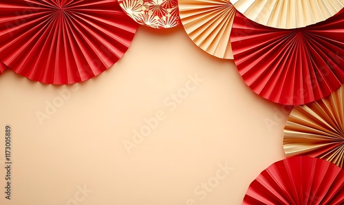 Decorative arrangement of red paper fans and cherry blossoms on a textured background
