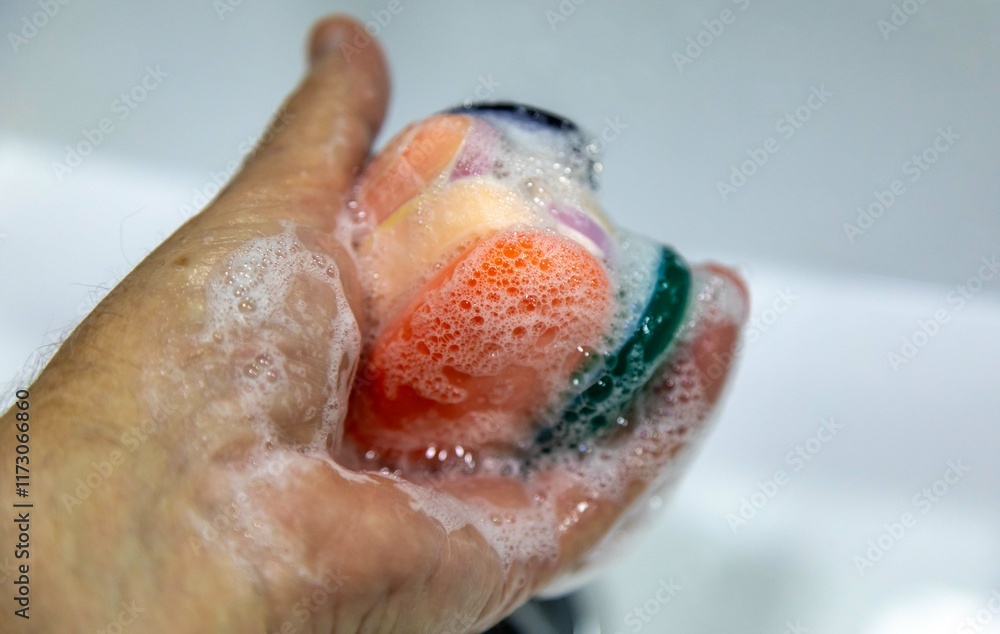 Fototapeta premium Used soaps glued together to form a ball. Ball of Used Soaps of different colors. economy and use