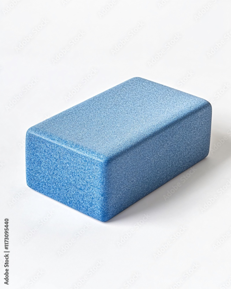 Blue Foam Yoga Block with Textured Surface Isolated on White Background Blue Foam Yoga Block with Textured Surface Isolated on White Background