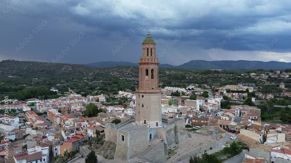 medieval spanish town in summer with big tower medieval spanish town in summer with big tower