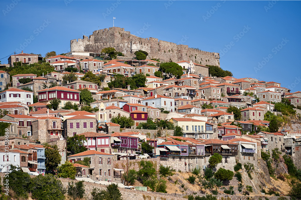 Historic houses and castle on top of a hill in Molyvos on the island of Lesbos Historic houses and castle on top of a hill in Molyvos on the island of Lesbos