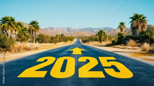 A large, bold '2025' marking points ahead on a tranquil desert road, inviting reflection on the journey ahead and the possibilities that await in the coming years. photo