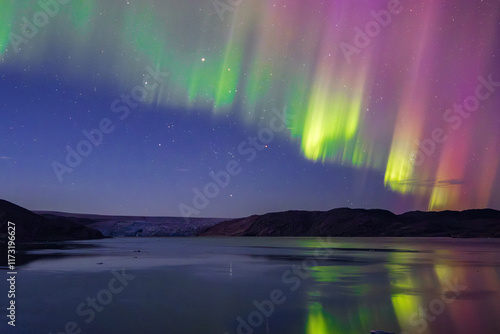 Northern lights in the glacier of Qaleraliq (South Greenland)	
 photo