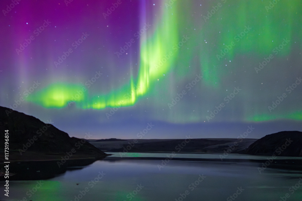 Naklejka premium Northern lights in the glacier of Qaleraliq (South Greenland) 