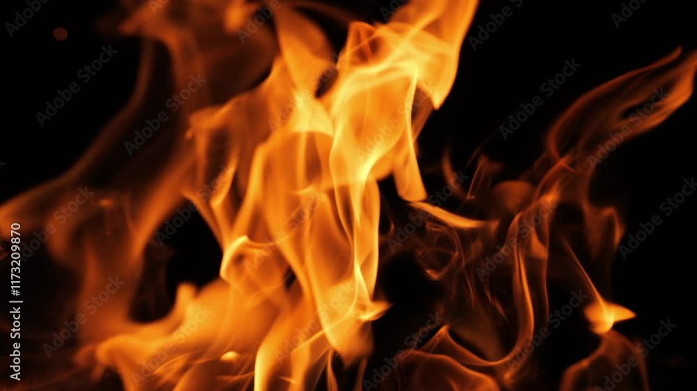 Beautiful flames from a campfire in a warm fireplace. Fiery natural background. Beautiful flames from a campfire in a warm fireplace. Fiery natural background.
