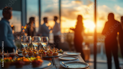 Elegant business event with appetizers and sunset view