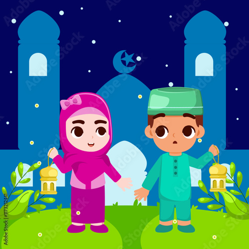 Muslim boys and girls see fireflies in front of the mosque welcoming the coming of the month of Ramadan