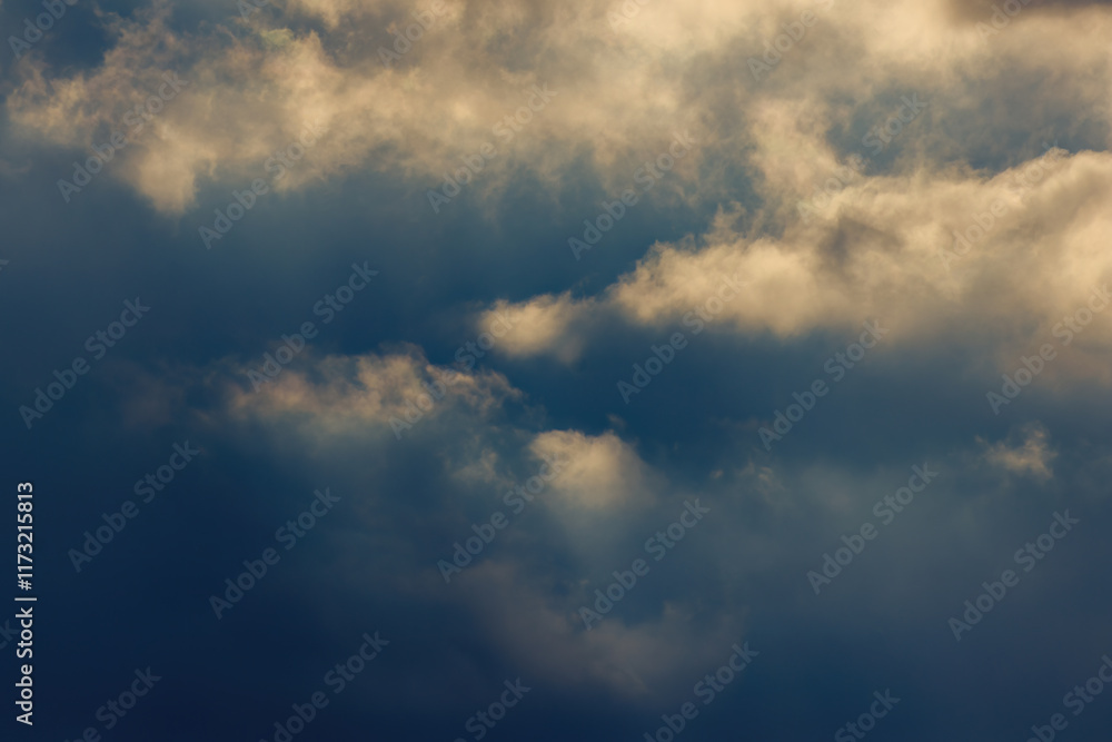 Very close view of dense cumulus clouds over the western Andean mountains of central Colombia, illuminated by sunlight of the afternoon. Very close view of dense cumulus clouds over the western Andean mountains of central Colombia, illuminated by sunlight of the afternoon.